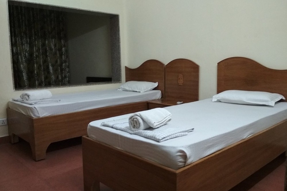parmarth niketan ashram rishikesh room booking