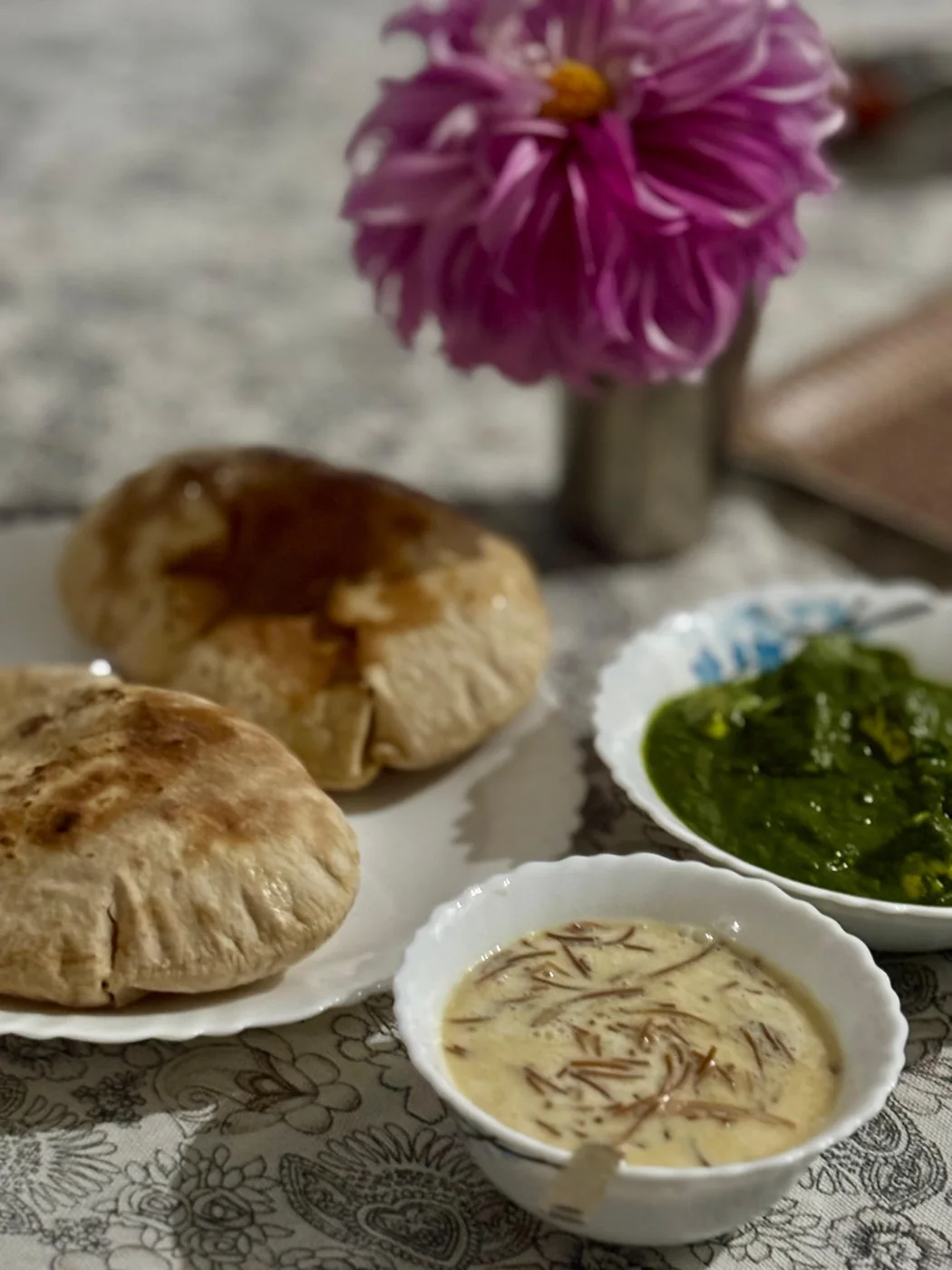 Traditional Indian curry, roti, vegetable pulao and a refreshing lassi